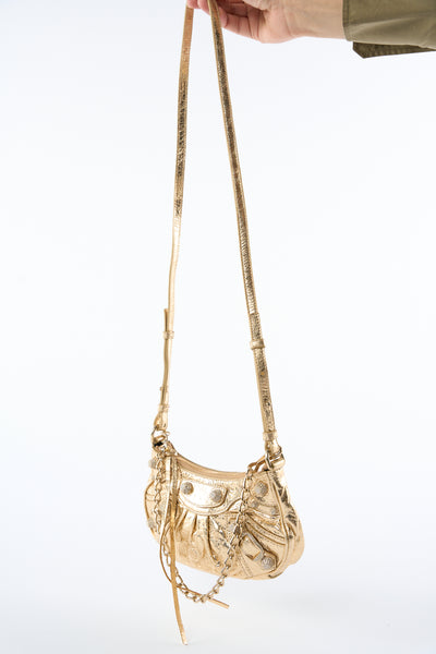 BALENCIAGA mini Le Cagole gold mettalic handbag with crystals never worn