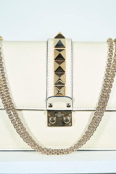 VALENTINO rockstud cream handbag with gold hardware