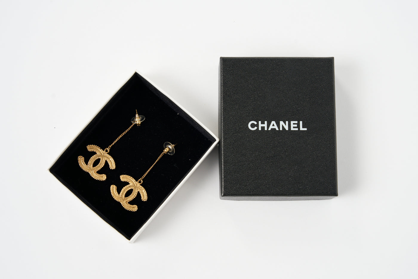 CHANEL gold dangling "CC" earrings with box