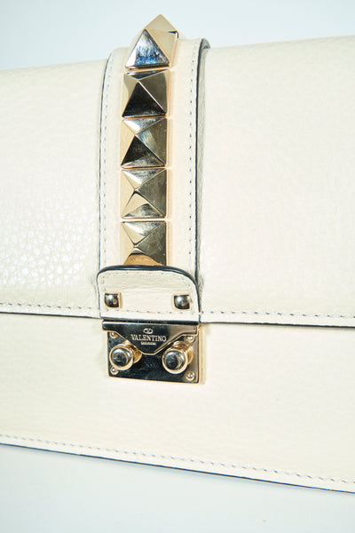 VALENTINO rockstud cream handbag with gold hardware