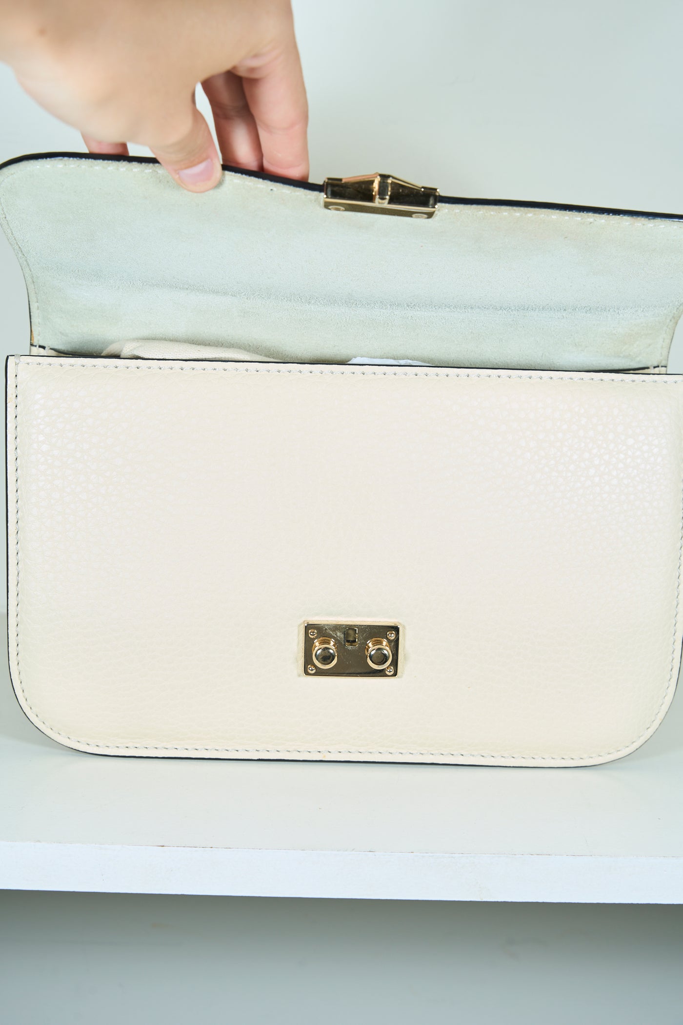 VALENTINO rockstud cream handbag with gold hardware