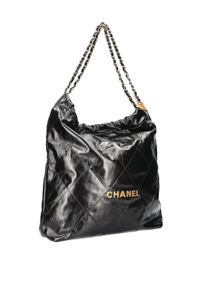 CHANEL 22 black leather handbag with gold hardware never worn