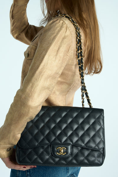 CHANEL Classic Jumbo Caviar single flap handbag with gold hardware