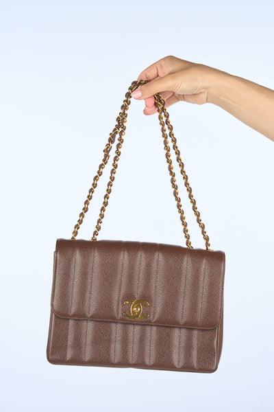 CHANEL mademoiselle vertical caviar brown 24ct gold hardware handbag