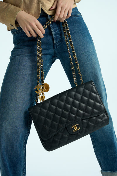 CHANEL Classic Jumbo Caviar single flap handbag with gold hardware