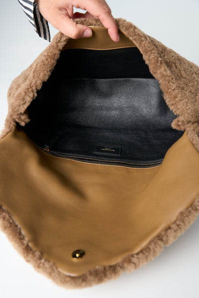 SAINT LAURENT beige shearling "Sade" YSL logo plaque large envelope clutch
