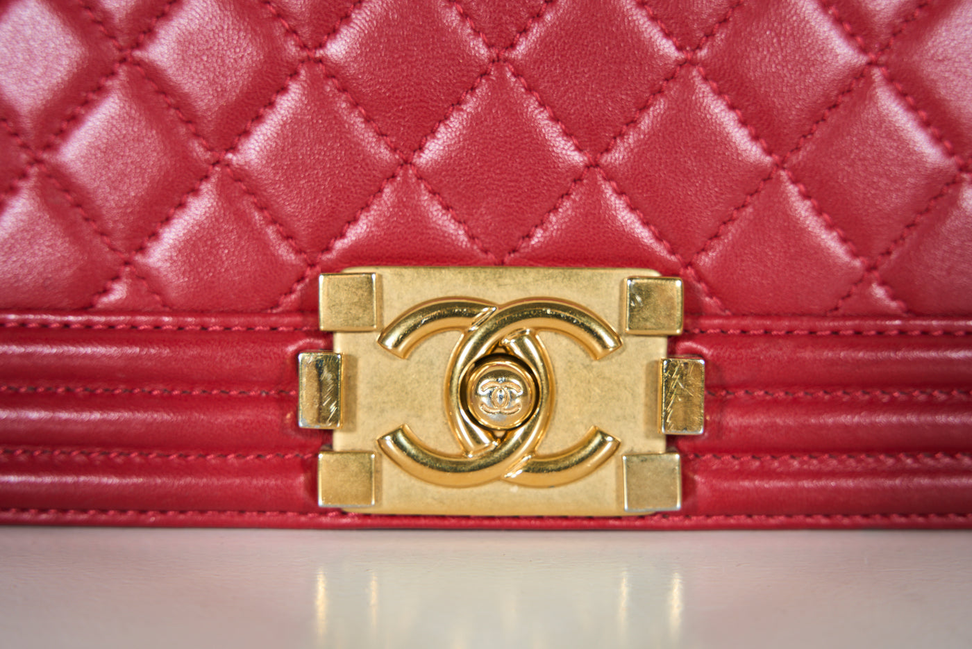 CHANEL red medium boy handbag with gold hardware