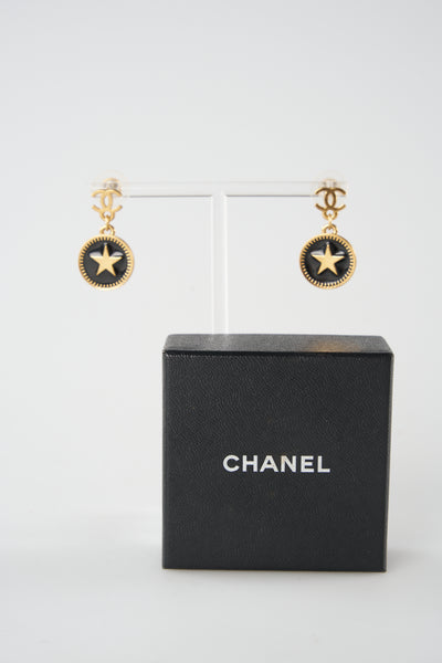 CHANEL black and gold star earrings with box