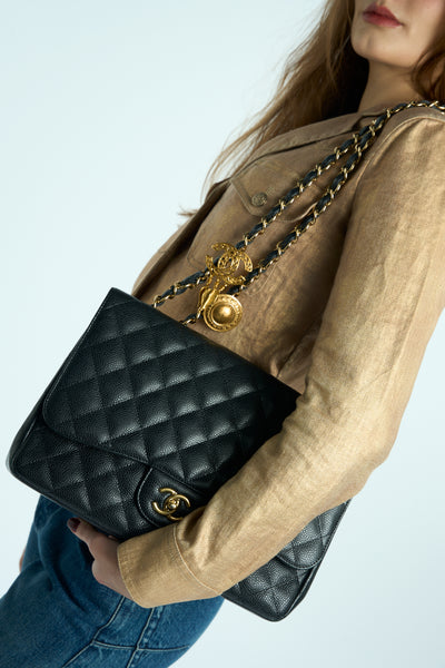 CHANEL Classic Jumbo Caviar single flap handbag with gold hardware