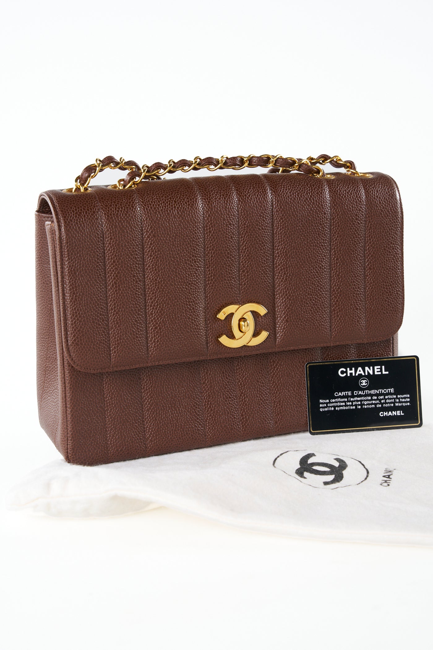 CHANEL mademoiselle vertical caviar brown 24ct gold hardware handbag