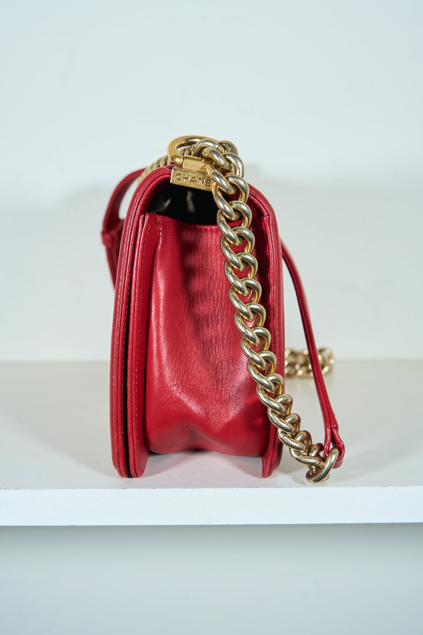 CHANEL red medium boy handbag with gold hardware