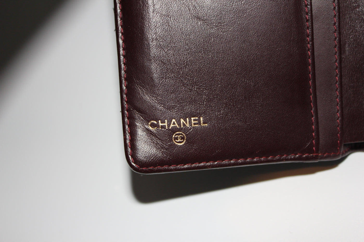 CHANEL long flap wallet black caviar leather with gold cc