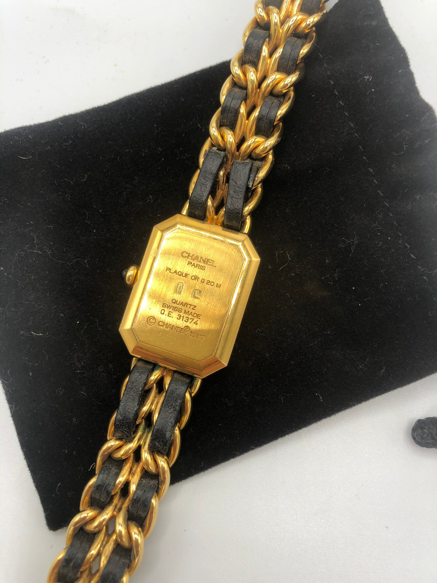 CHANEL Vintage Premiere Watch 24 carats gold and intertwined leather