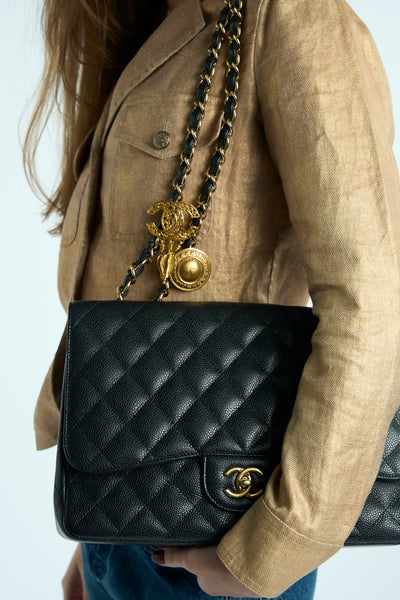 CHANEL Classic Jumbo Caviar single flap handbag with gold hardware