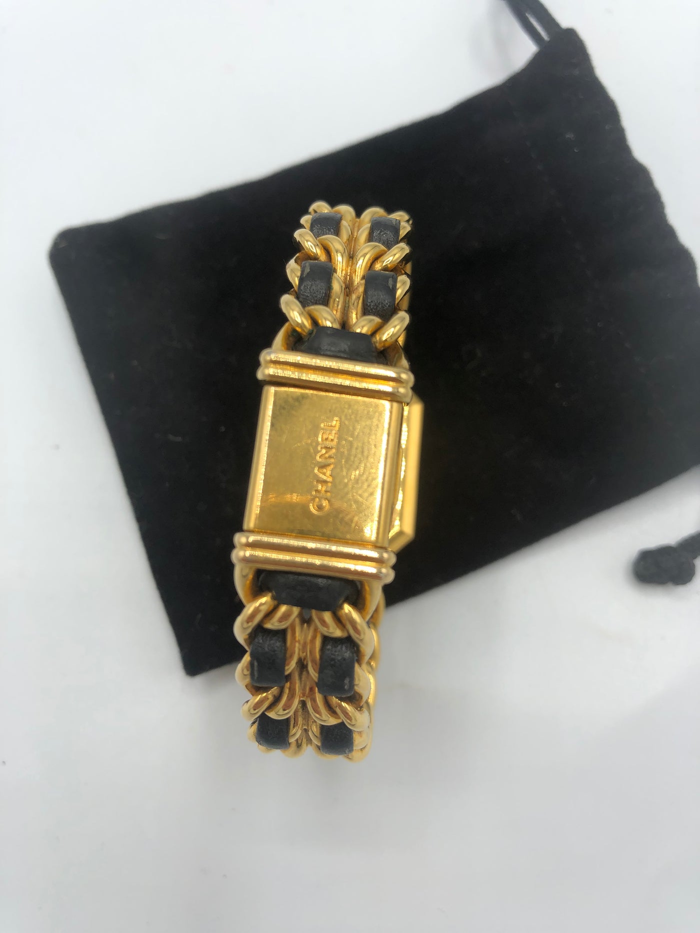 CHANEL Vintage Premiere Watch 24 carats gold and intertwined leather
