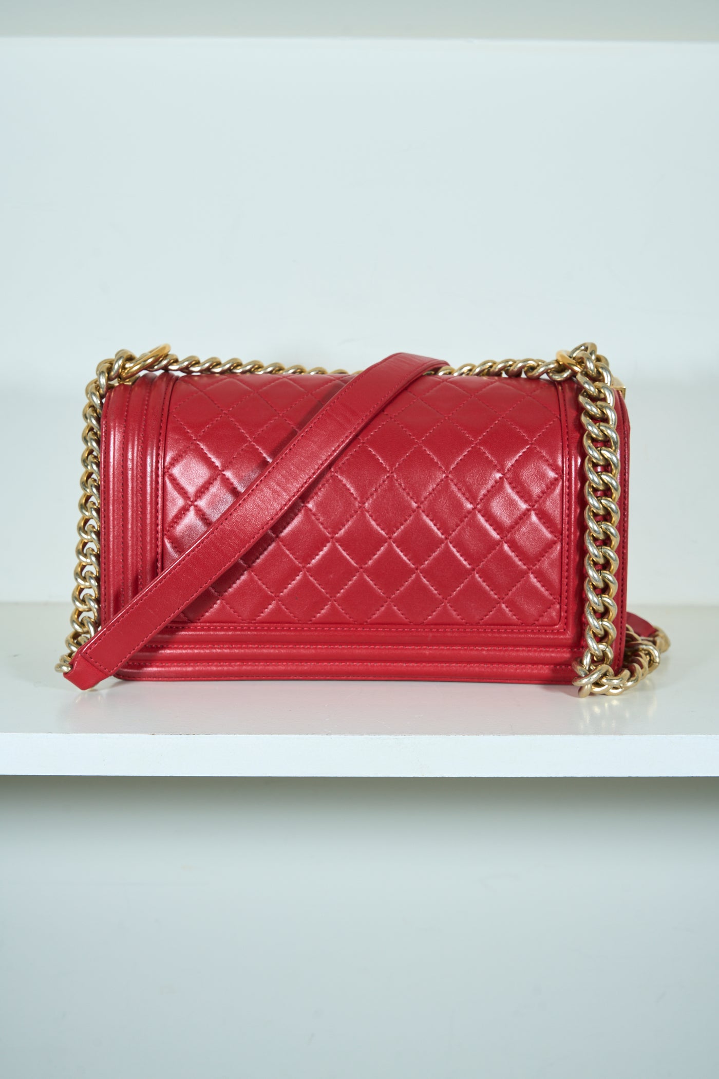 CHANEL red medium boy handbag with gold hardware