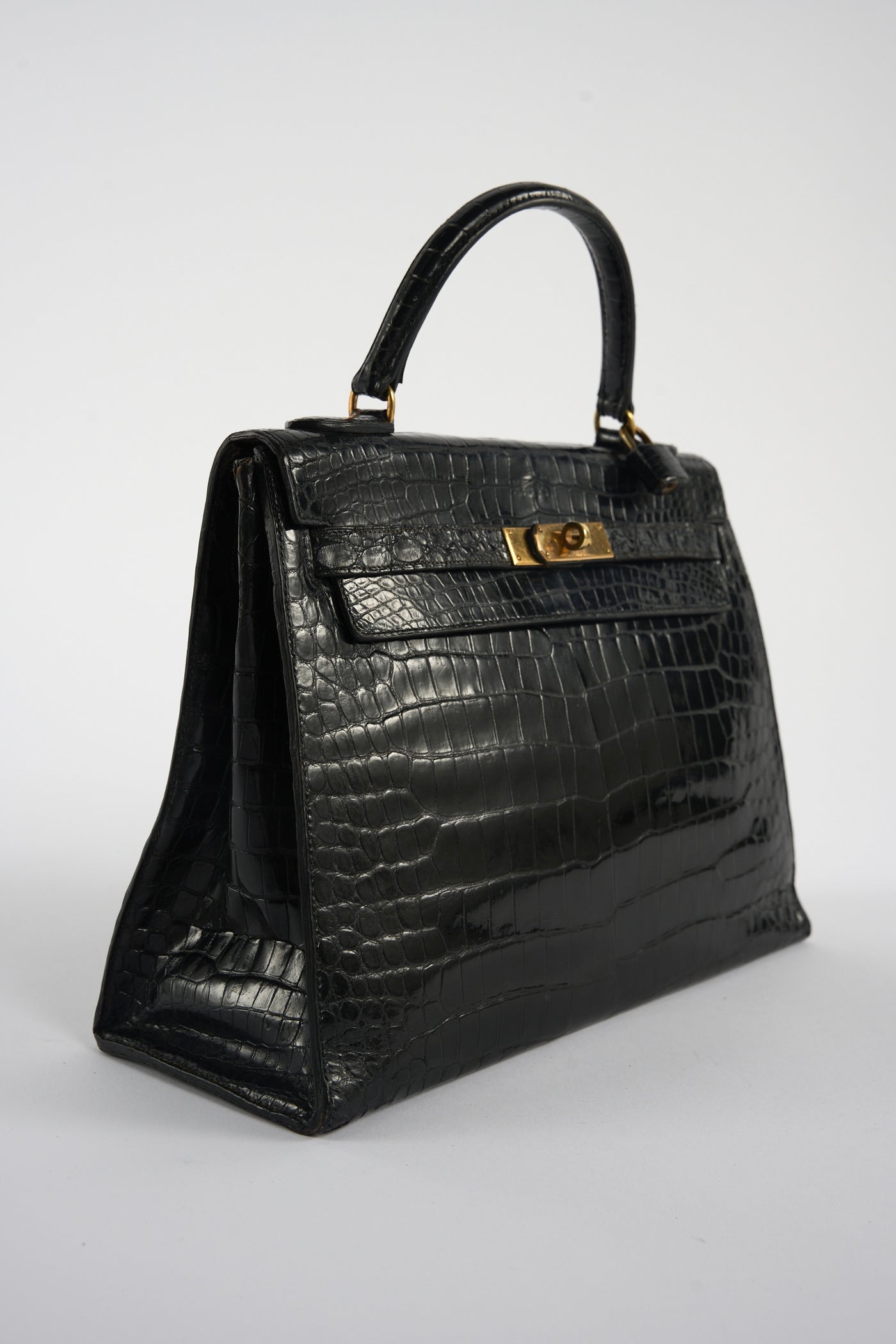 HERMES Kelly 32cm black shiny porosus crocodile ghw 1970's