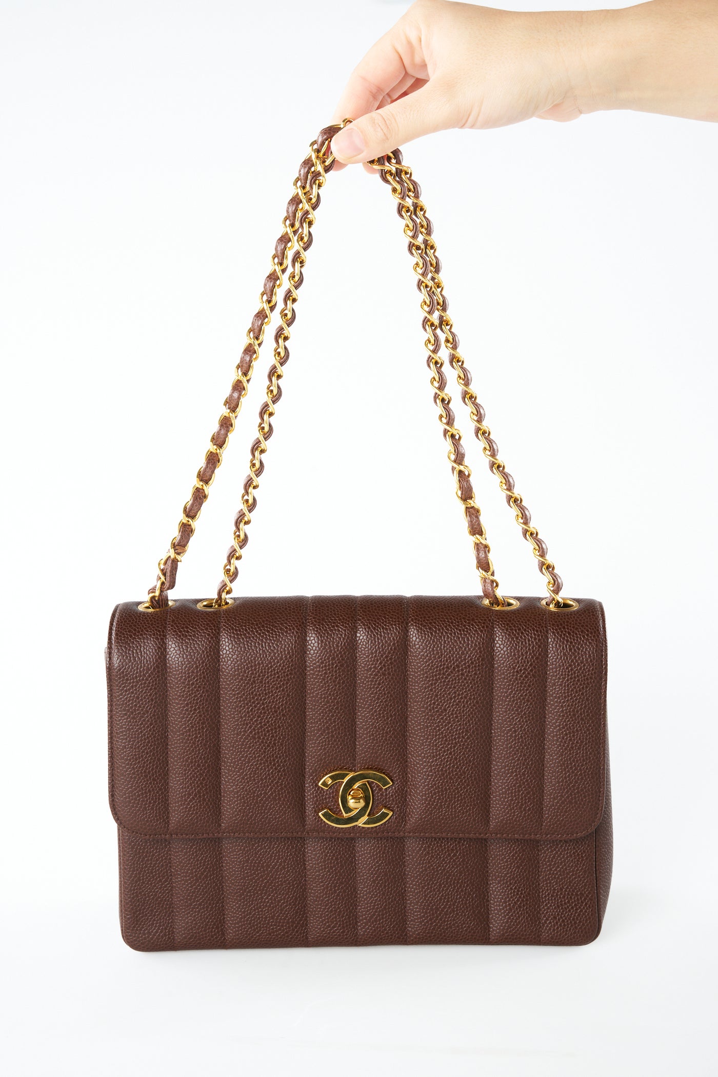 CHANEL mademoiselle vertical caviar brown 24ct gold hardware handbag