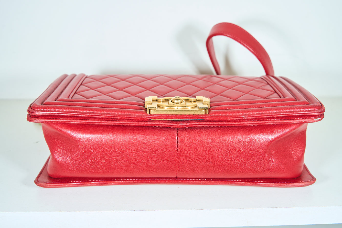 CHANEL red medium boy handbag with gold hardware