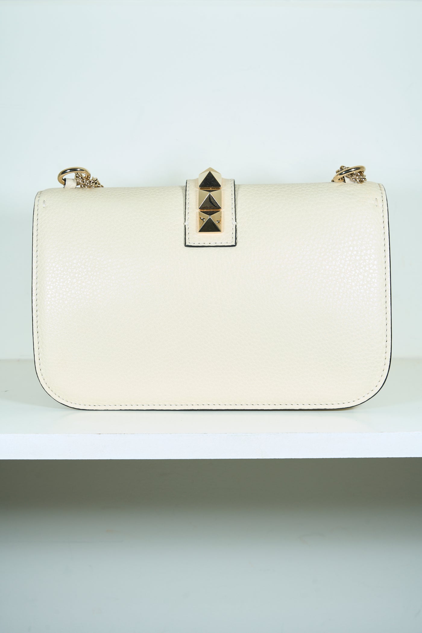 VALENTINO rockstud cream handbag with gold hardware