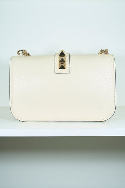 VALENTINO rockstud cream handbag with gold hardware