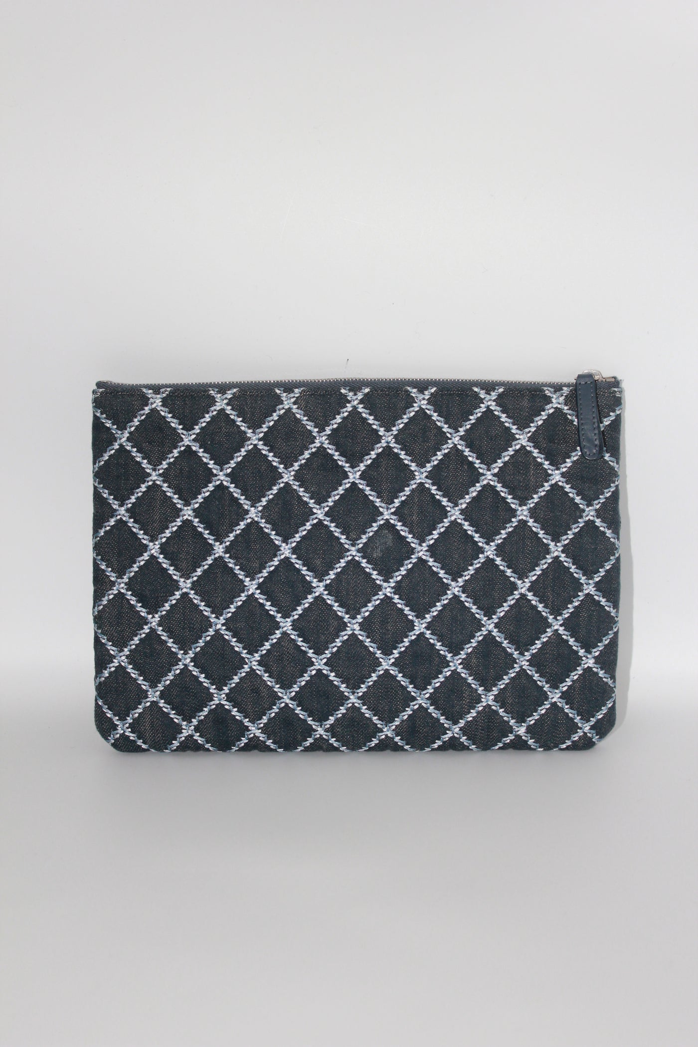 CHANEL blue denim zipper pouch with padded nylon interior