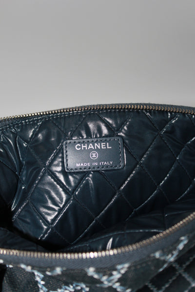 CHANEL blue denim zipper pouch with padded nylon interior