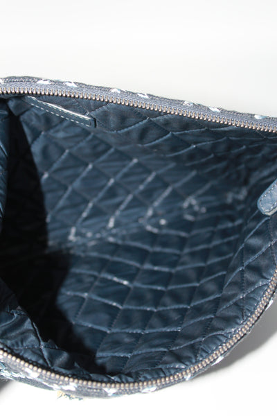 CHANEL blue denim zipper pouch with padded nylon interior