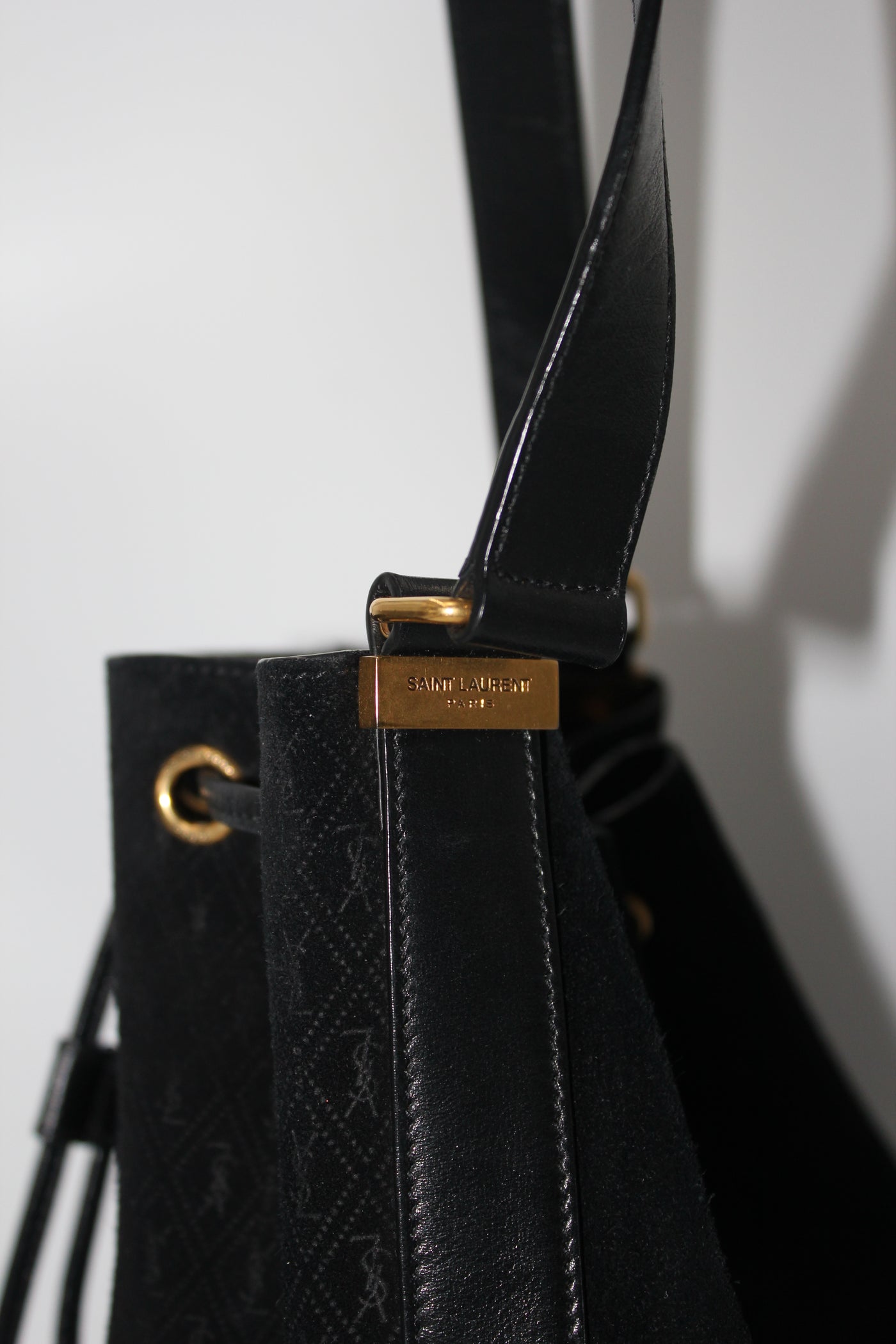 SAINT LAURENT suede monogram bucket bag