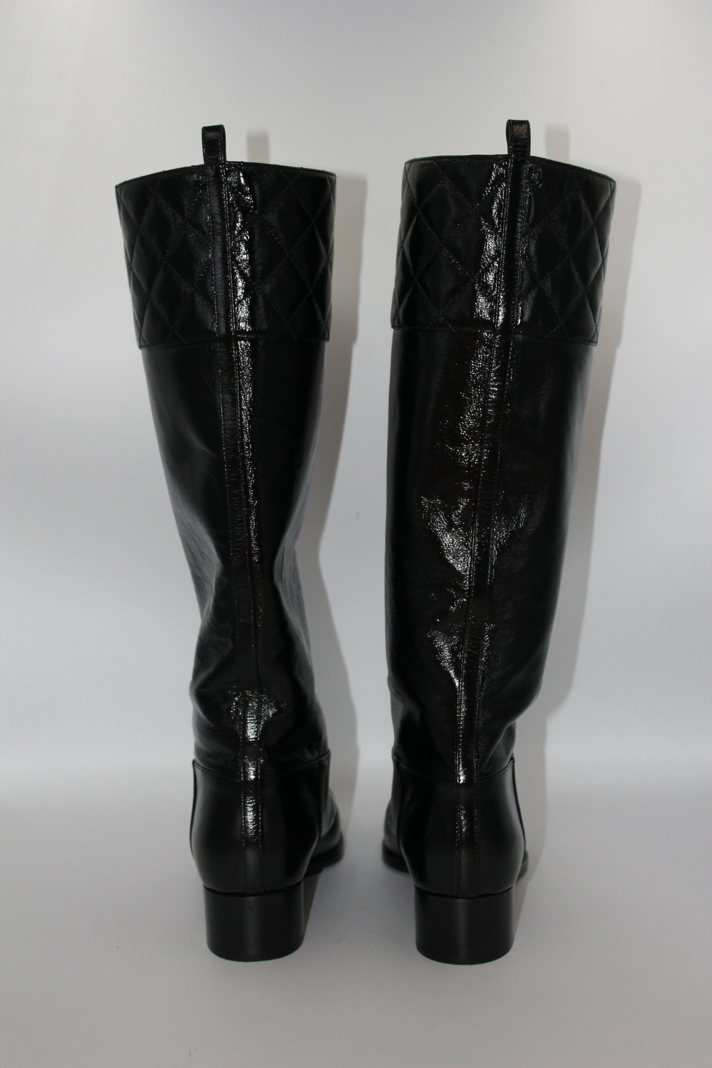 CHANEL black leather CC boots