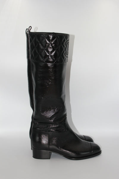 CHANEL black leather CC boots