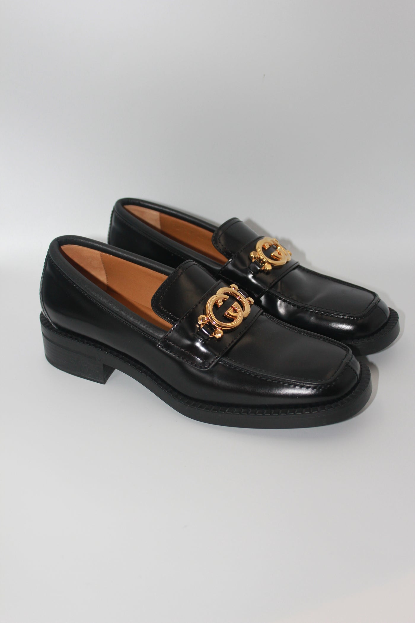 GUCCI black smooth leather loafers with gold GG buckle new in box size 41
