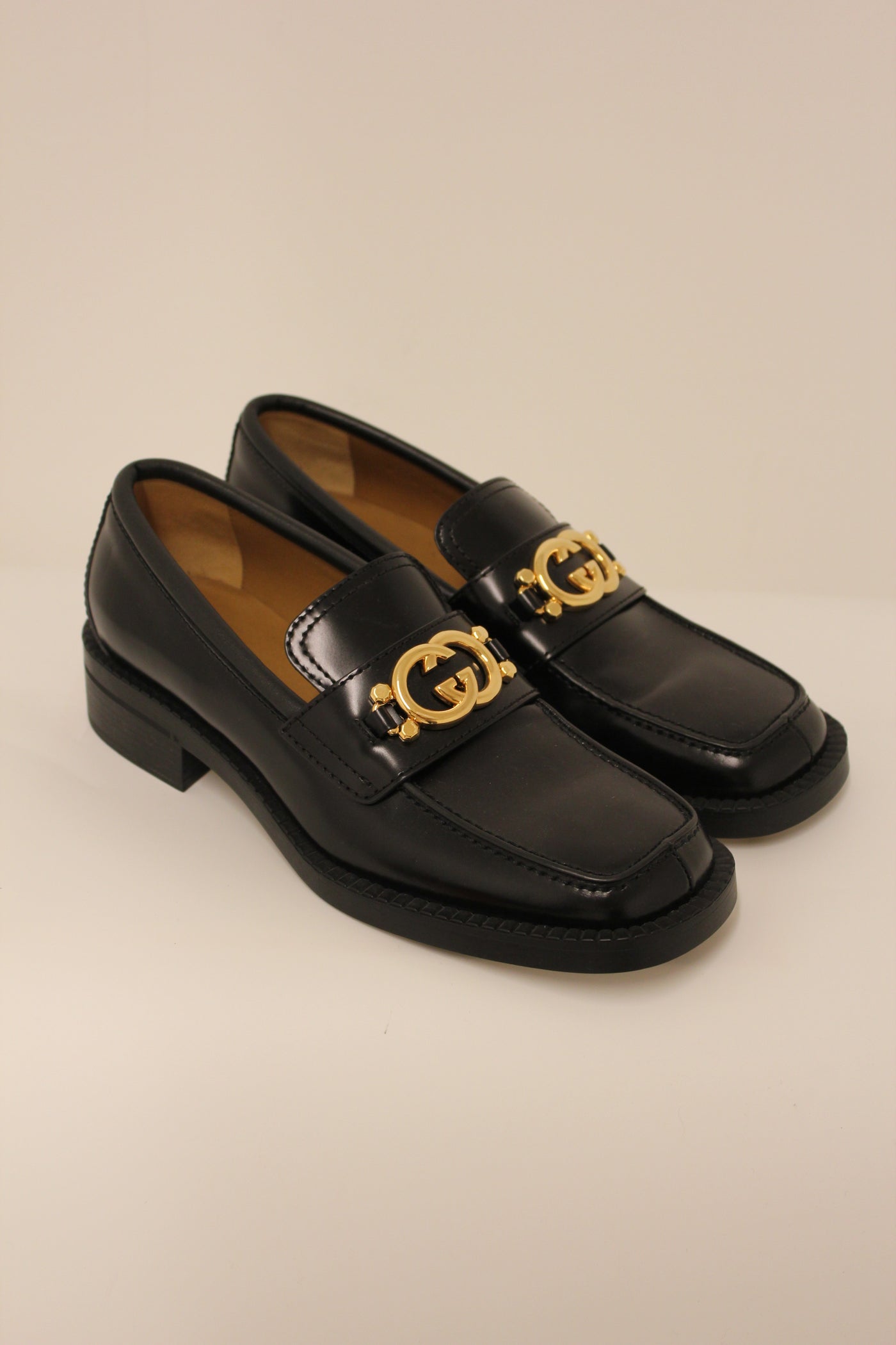 GUCCI black smooth leather loafers with gold GG buckle new in box size 41