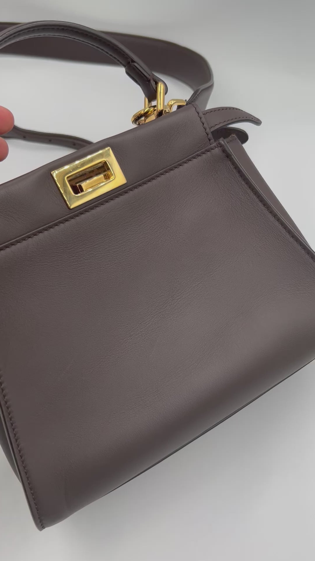 FENDI mini peekaboo dark brown with gold hardware and long strap