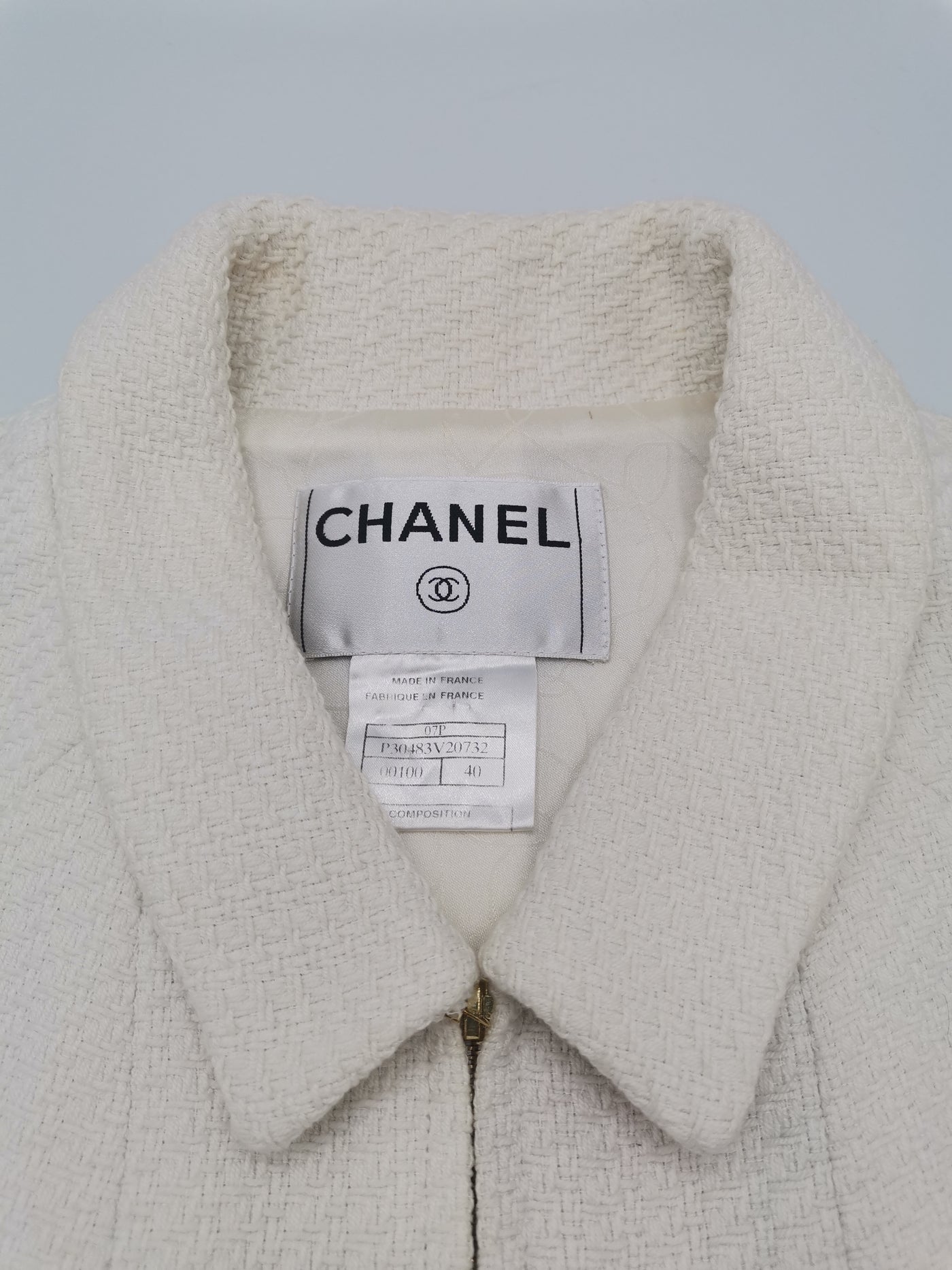 CHANEL white suit top+skirt with gold buttons