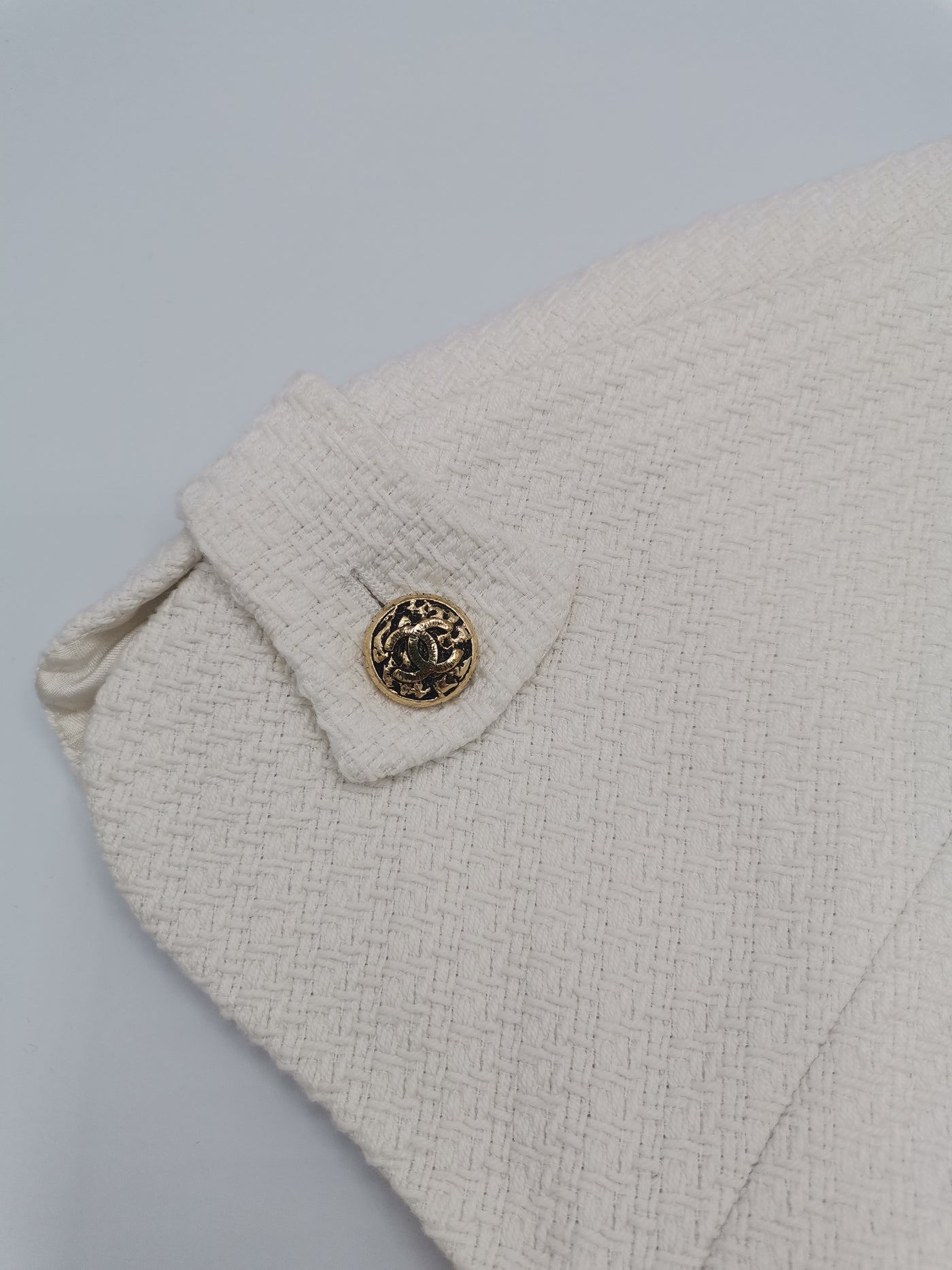 CHANEL white suit top+skirt with gold buttons